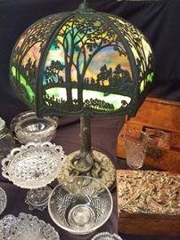 Slag glass lamp shade on tree stump base