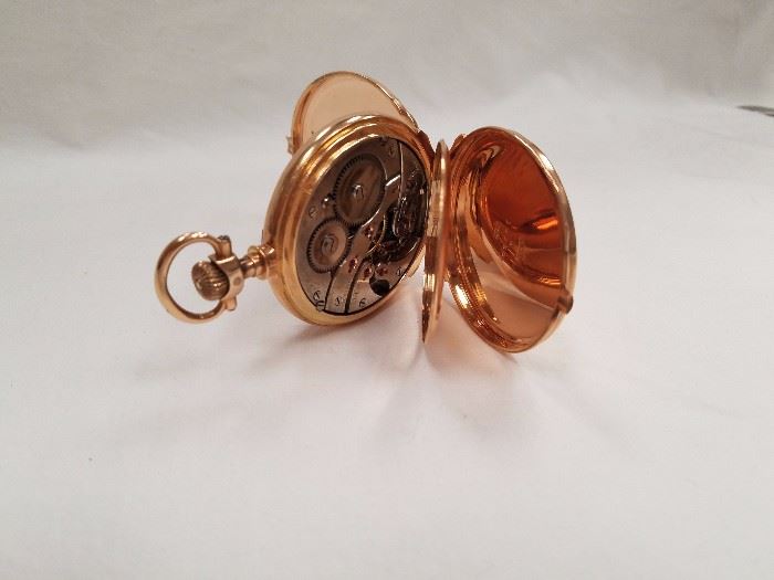 One of several gold pocket watches