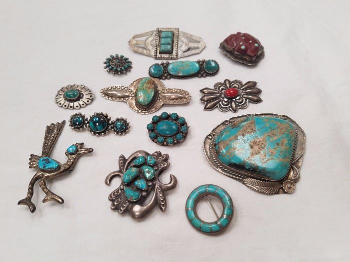 Sampling of many sterling and turquoise brooches
