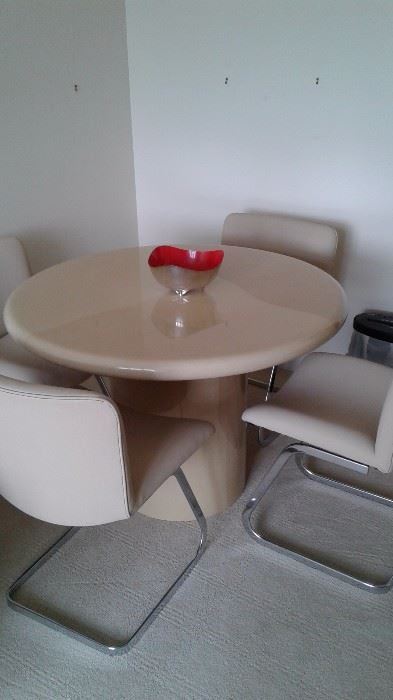 Mid century modern dinette with pristine pebble leather chairs
