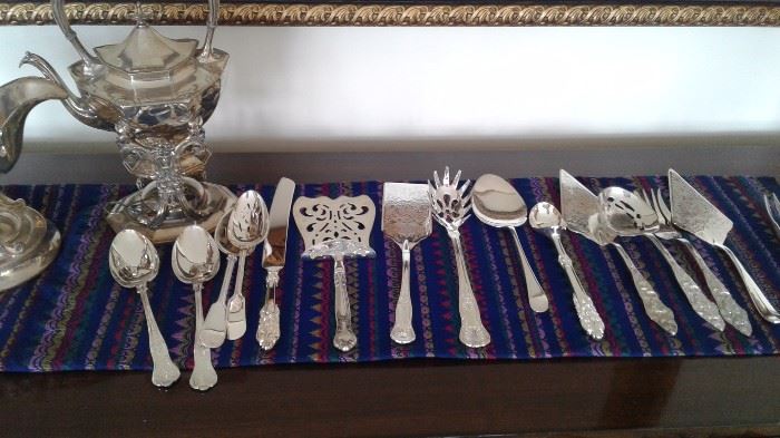 Selection of sterling and plate serving pieces