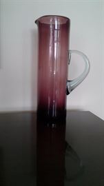 Hand blown colored glass pitcher