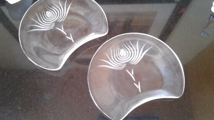 Two of a set of 12 Lalique cresent plates