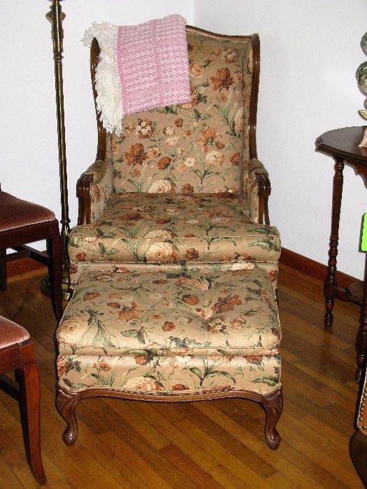 One of two chairs with matching ottoman