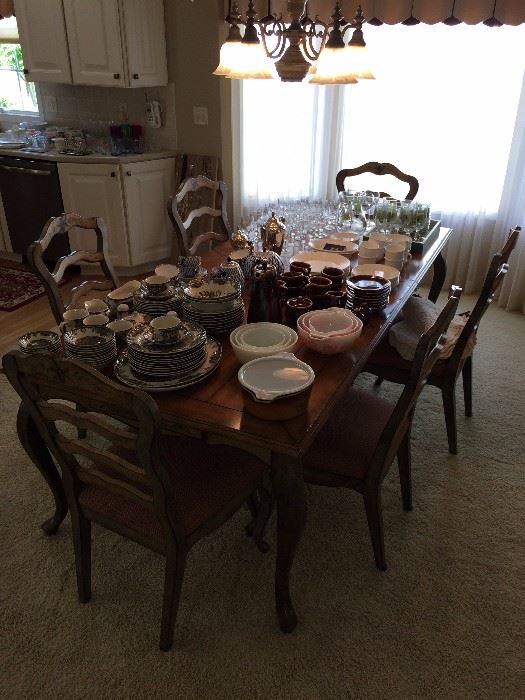 Dining table w/6 chairs; Pyrex; Johnson Bros. dinnerware; other nice dinnerware and glassware.