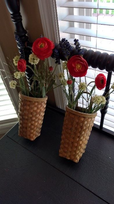 I took these off the wall.  Great wall baskets...you can change the flowers to match your decor.