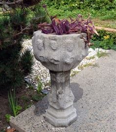 Stone jardiniere in Saints motif