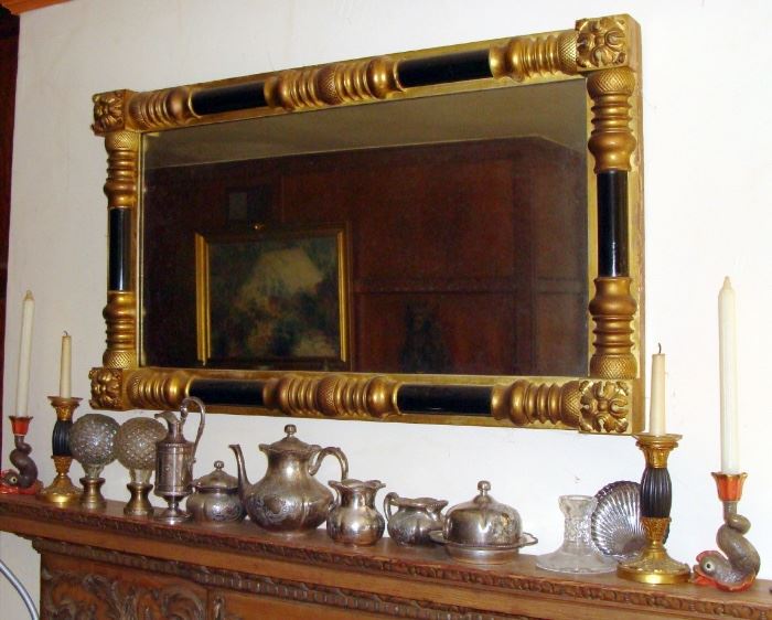 Neoclassical mirror, Herend vintage dolphin candlesticks, quadruple plate pieces