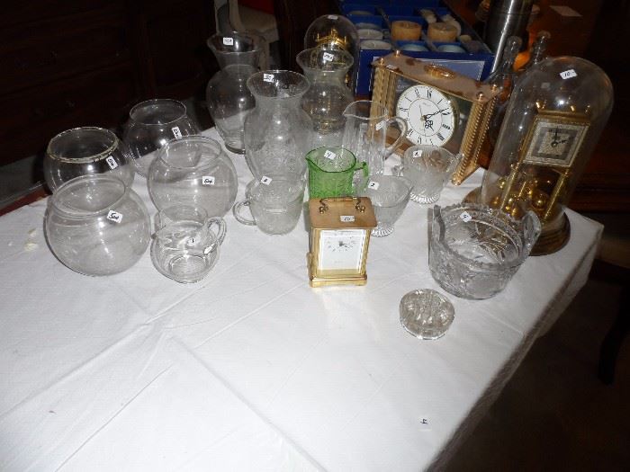 assorted glassware and small clocks