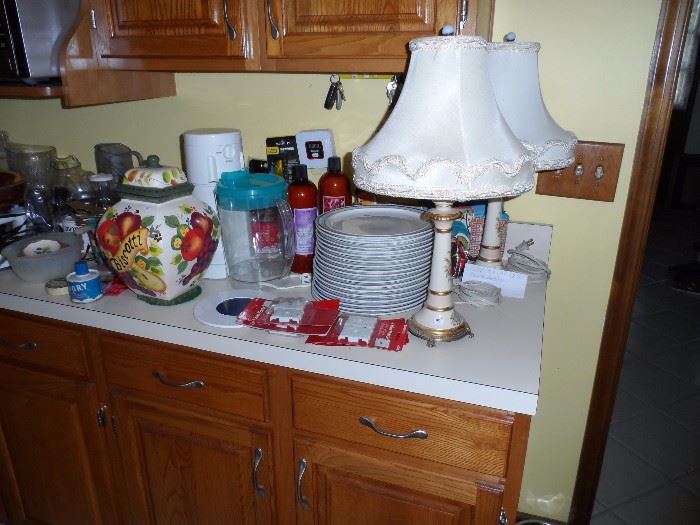 assorted items including vintage lamps, dinner plates, collectibles, iced tea maker and WEN hair care products