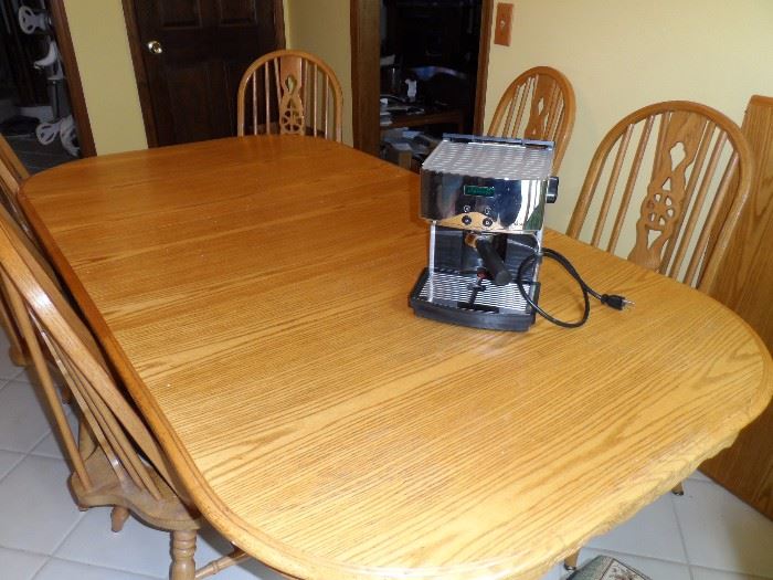 Nespresso espresso maker and solid Oak table with two leaves and 8 chairs