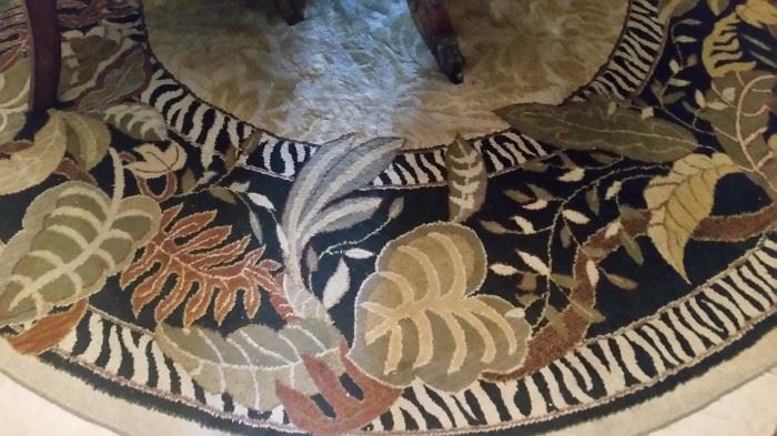 The beautiful rug under it.