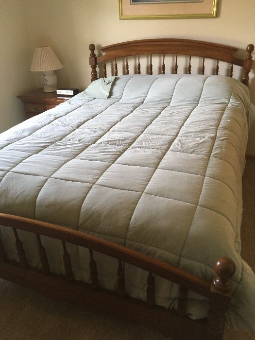 This is a second queen bed that has matching night stands and dresser.