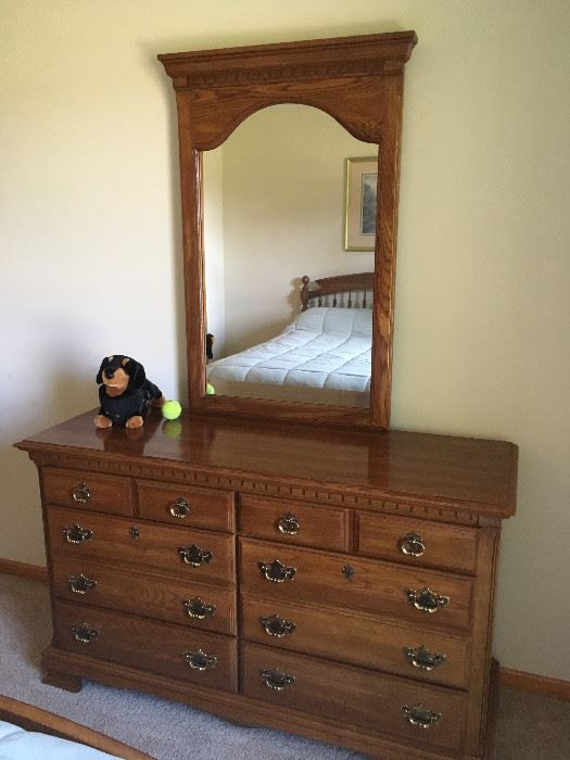 This is a beautiful oak dresser -- part of the two wonderful bedroom sets.