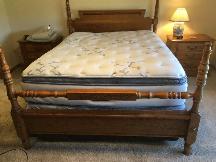 This is a beautiful American Drew Queen bed with a Sealy mattress set -- looks inviting and comfortable.