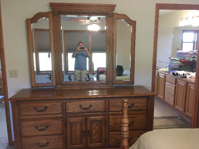 This is a part of an original Queen bedroom set that retailed for over $10,000.00.  Google American Drew furniture -- excellent quality productions for many years.  This dresser is part of a 4-piece set that includes the Queen bed (post in foreground) and two night stands.