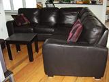 Black leather sectional sofa. Custom made Scandinavian- originally cost over $4000- priced to sell!