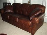 beautiful brown leather couch in very fine like new condition.