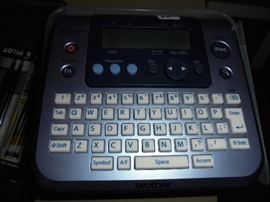 Brother P-Touch label maker w/extra cartridges 