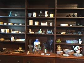 Bakelite items for vanity (brushes, combs, etc.), vases, covered small dishes, Franciscan Rose plates and coffee pot, circular flower frog