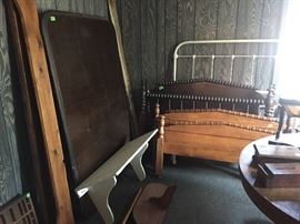 Old beds with head & foot boards.  Wall shelves