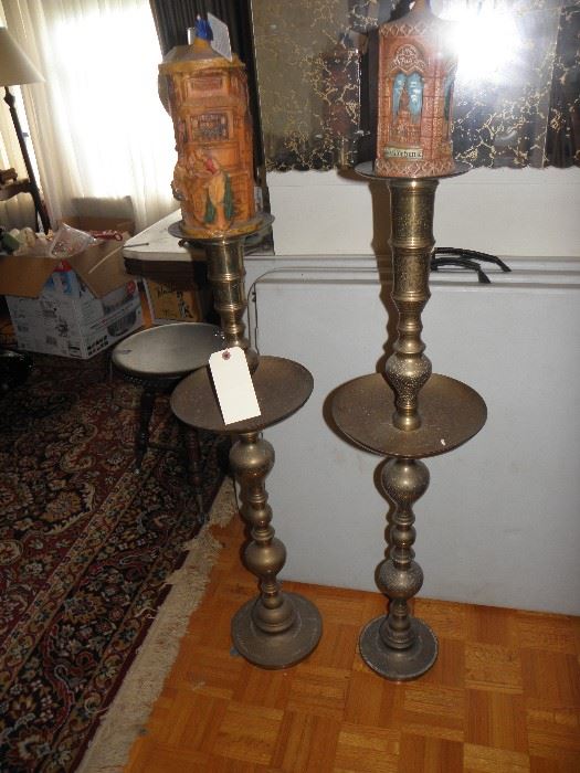 Tall solid brass candlesticks with forever German candles
