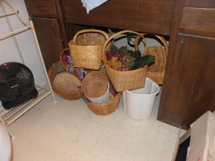 Lots of baskets, towel rack, small fan