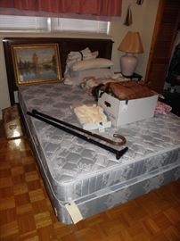 Full size mattress, box spring, frame and headboard.  Old canes, purses, penoir set in yellow (large).  Bed pillows.  Oil on canvas