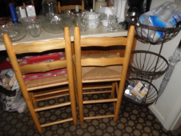 Set of four ladder back bar stools, metal organizer