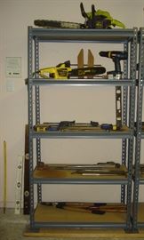 Chainsaws, tools, garage shelves