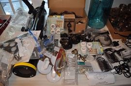 National Geographic large telescope with stand (new), various new curtain rods, rings, brackets, blown glass lamp base (lamp with shade), canning jars with candle holder inserts