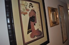 Variety of framed art and mirrors