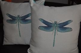 Oversized pillows with embroidered dragonflies