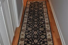 One of many runners and area rugs offered