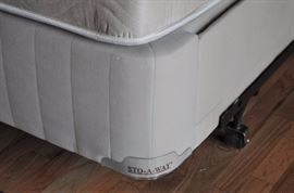 Sto-A-Way queen mattress foundation with 4 drawers
