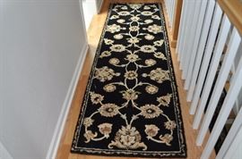 One of several runners and area rugs available