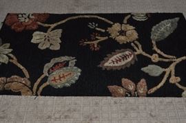 One of several rugs, runners, area rugs available