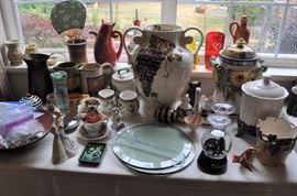Various items including tall vase, snow globe, canisters, pots, ornaments, candleholders, tea cups and saucers, foreign coins, mugs, pitcher, etc.