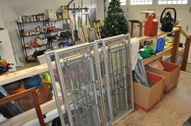 Four leaded glass windows with hanging hooks, garage items