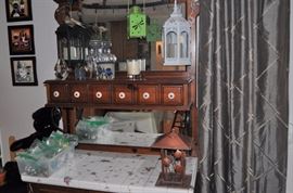 Pulaski tall cabinet with drawers and tiled counter, hand painted, hanging lanterns for candles