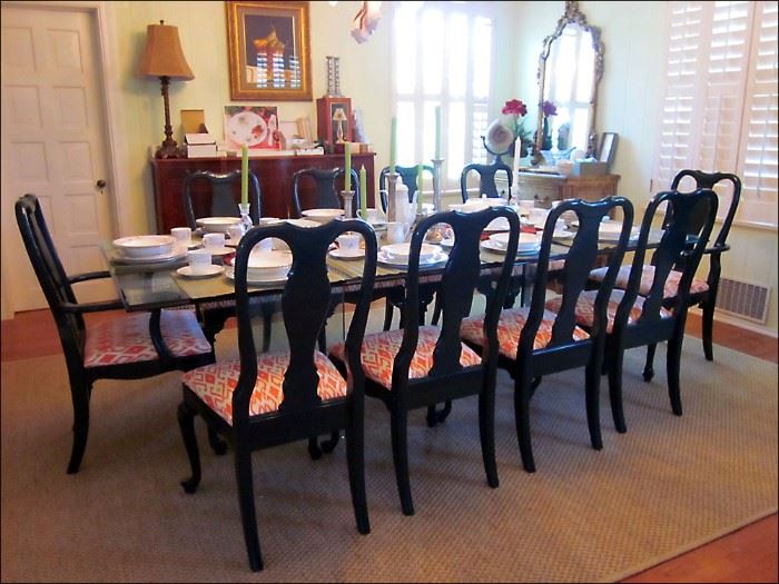 Glamorous Glass Dining Table with Ten Lacquered Dining Chairs.