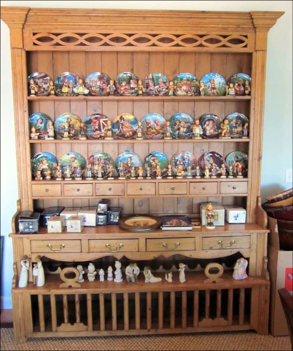 Two-Piece Pine Hutch with a Wine Rack.  Hummel Figurines and Plates.  Precious Moments.