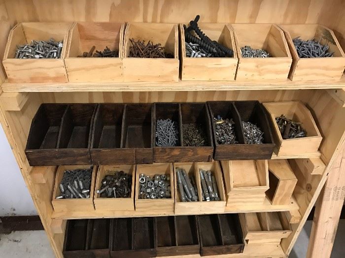 Nails, etc. in wood bins