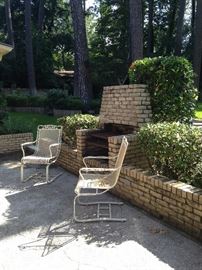 Two of the four matching spring chairs. A black table with 4 chairs is also available.