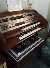 Baldwin organ with needlepoint seat on the bench