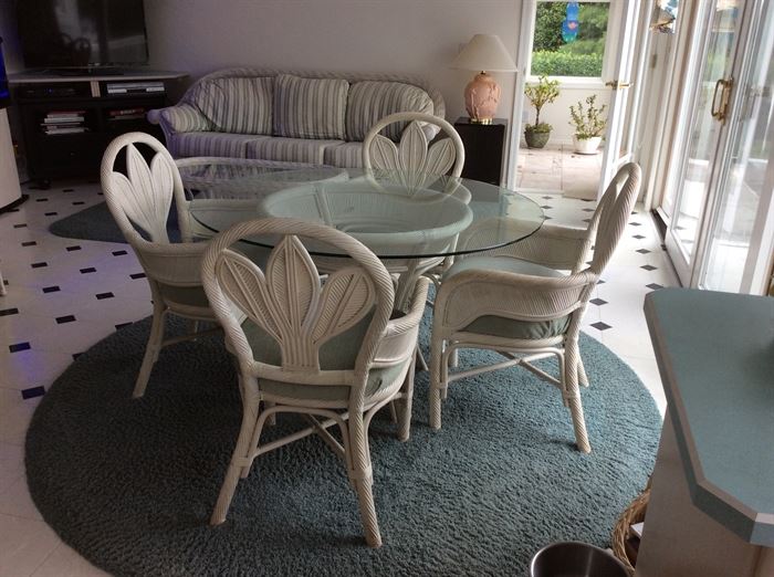 Glass top table with four chairs