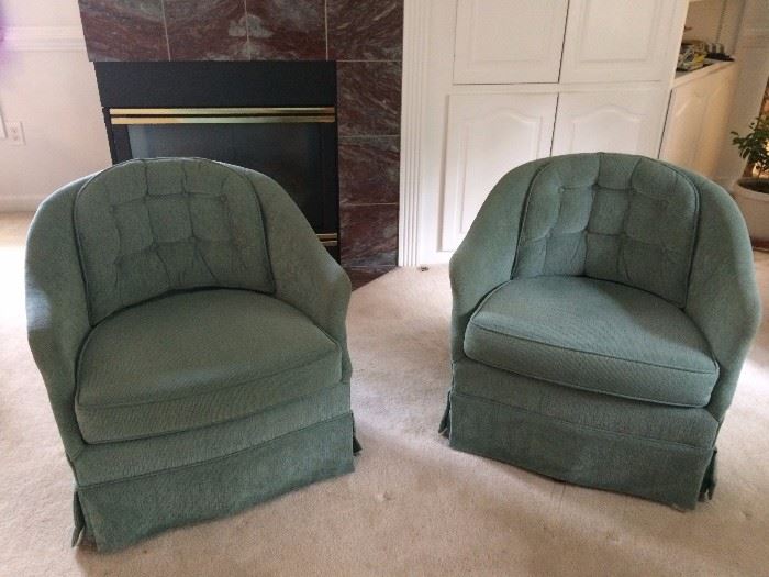 Mid Century barrel swivel style chairs. 