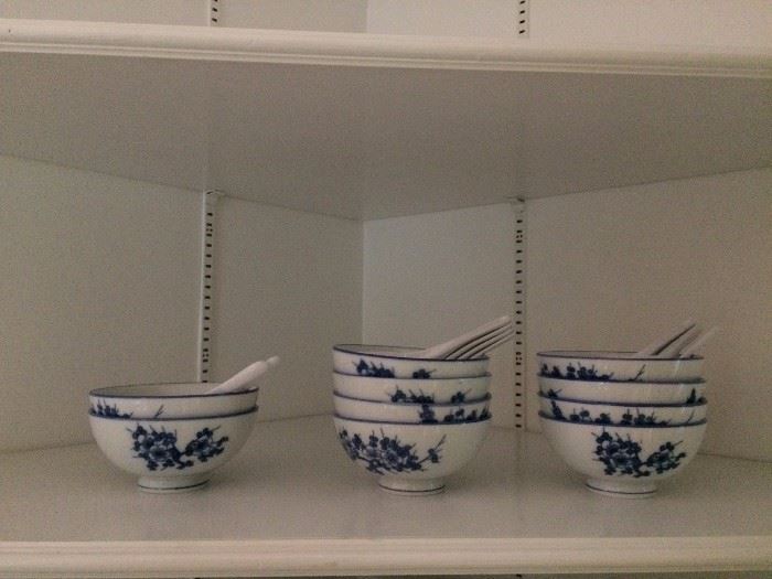 Set of 10 Asian blue and white porcelain rice soup bowls and spoons.