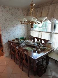 Vintage oak kitchen table with 6 leaves and 6 chairs