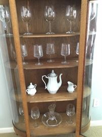Display case, glassware, cream, sugar, pitcher set